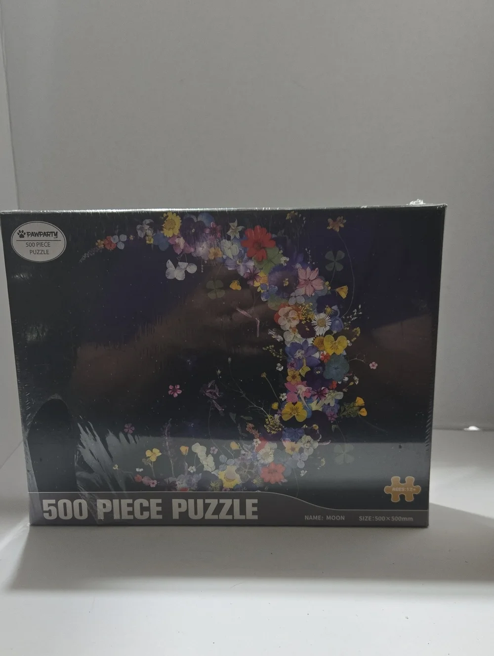 500 Piece Pawparty Floral Moon Puzzle - Black Background with Colorful Flowers